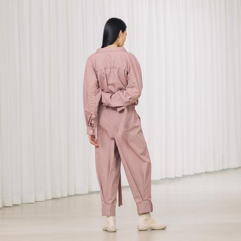 jumpsuit with gathering across the back and multiple pockets